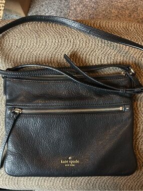Kate Spade black leather zip-front crossbody